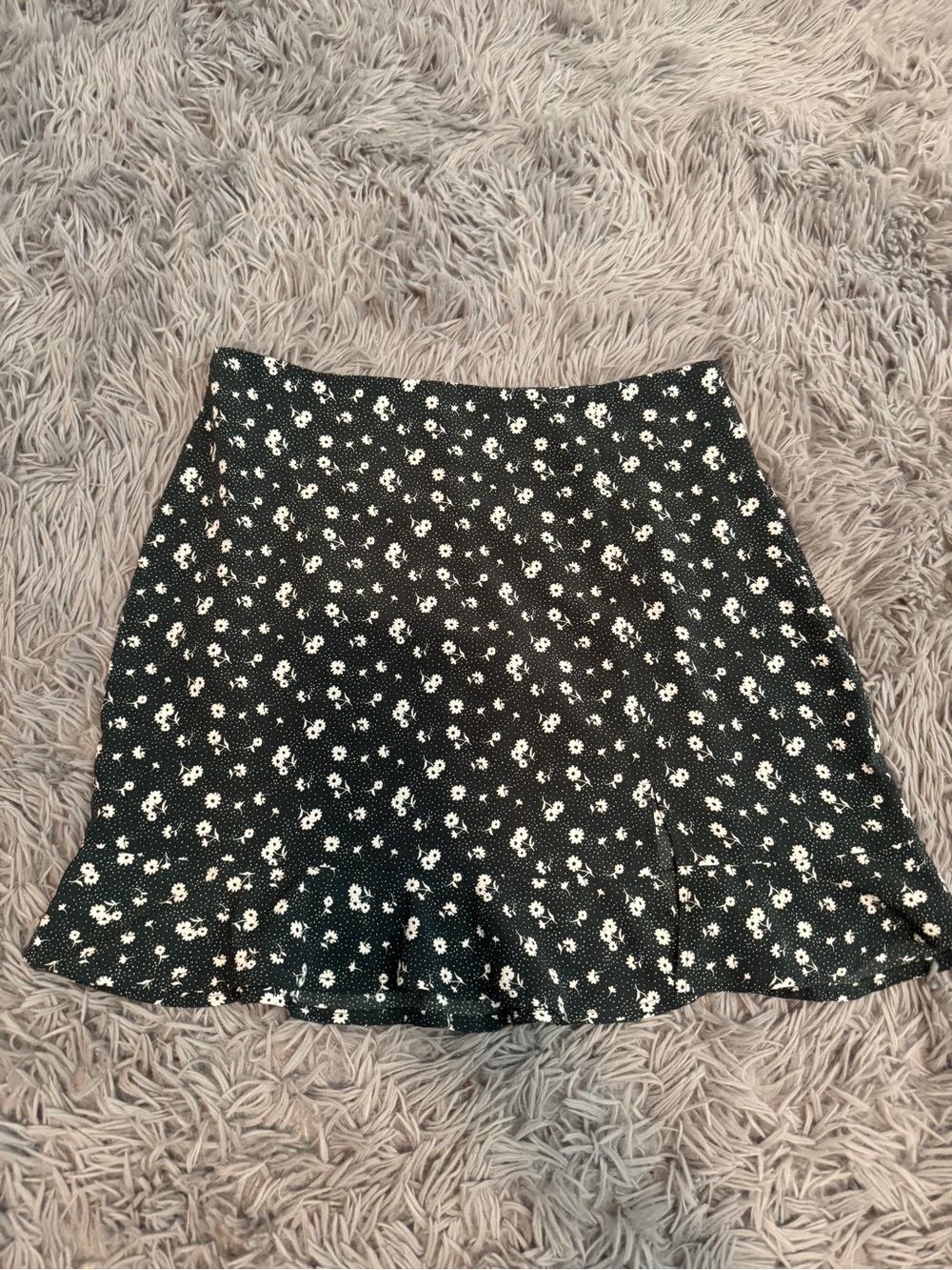 Kittenish Black Mini Skirt with White Floral Print